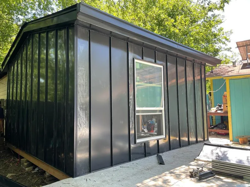 Black standing seam metal wall panels for Metal Roof Installation in Dallas